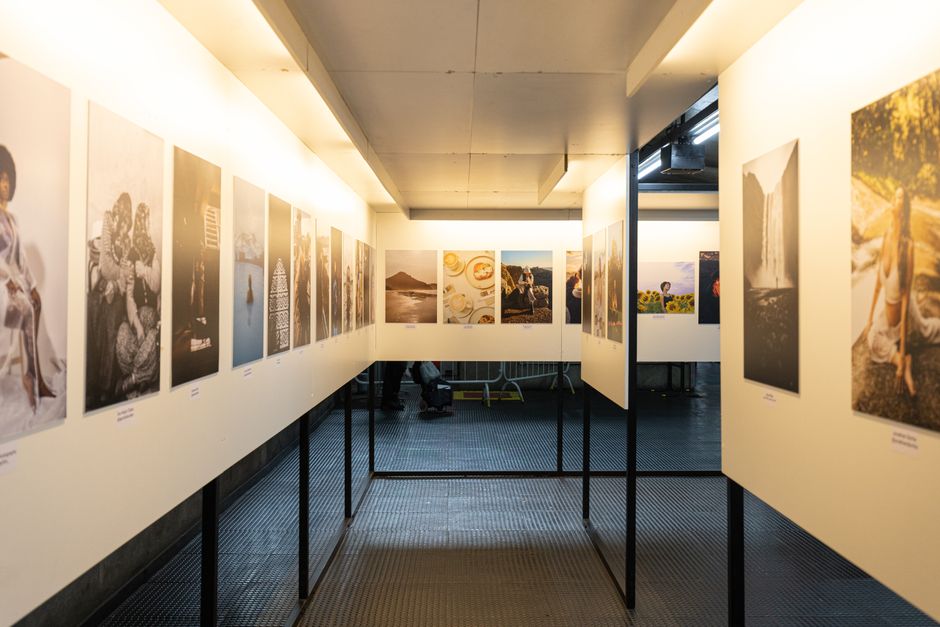 Photographs displayed on a gallery wall